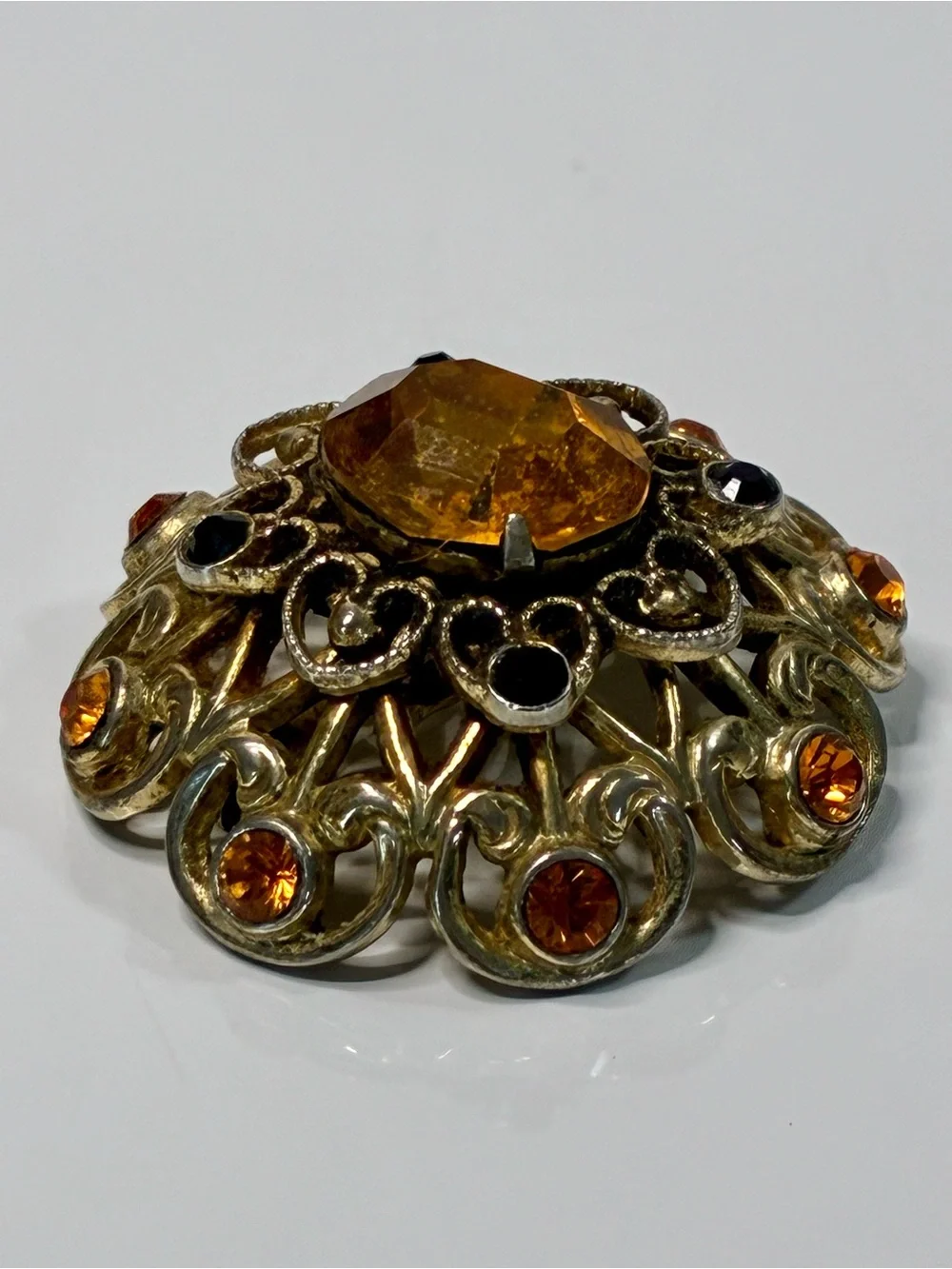 Coro Gold-Tone Heart Shaped Ornate Filigree Brooch with Amber and Black Stones